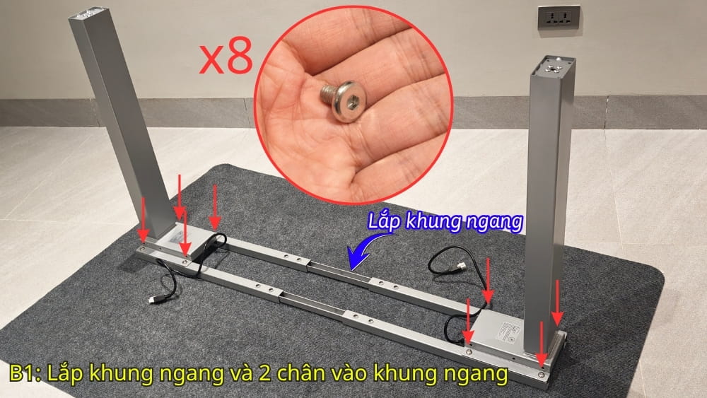 Bước 1: Lắp khung ngang và lắp 2 chân nâng hạ vào khung ngang